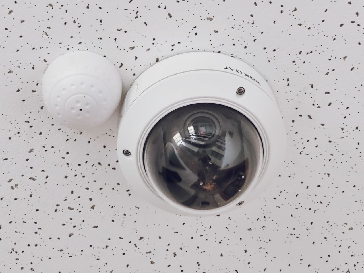 CCTV dome camera installed on office ceiling